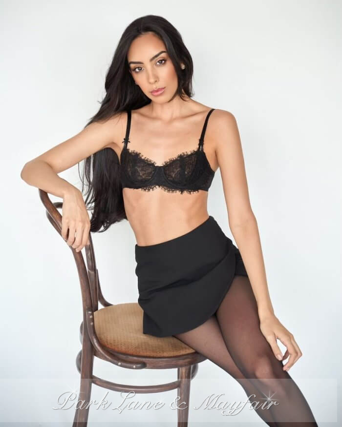Romantic model escort Glenda showing off her long legs