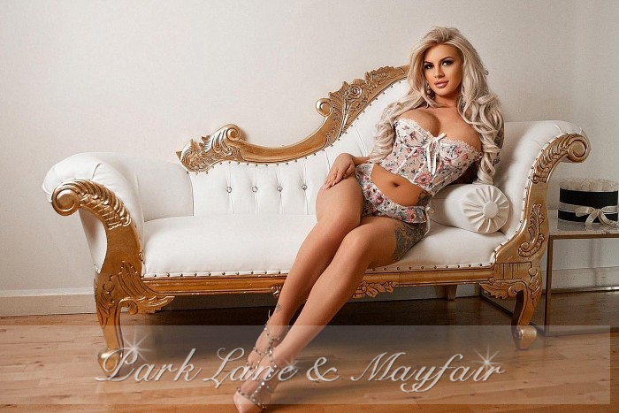 High end London escort Priya showing off her gorgeous toned figure