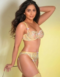 Fleur, a talented companion, proudly showcases her stunning, graceful curves.