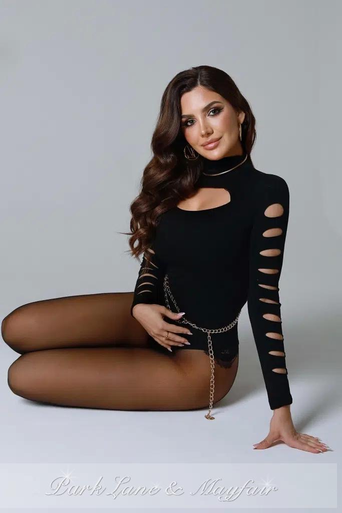 This alluring companion has an intriguing and mysterious demeanour.