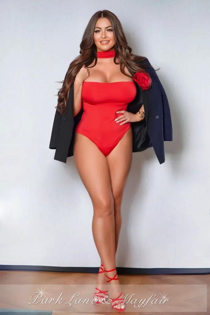 In this image, Christina radiates confidence and elegance in every detail.