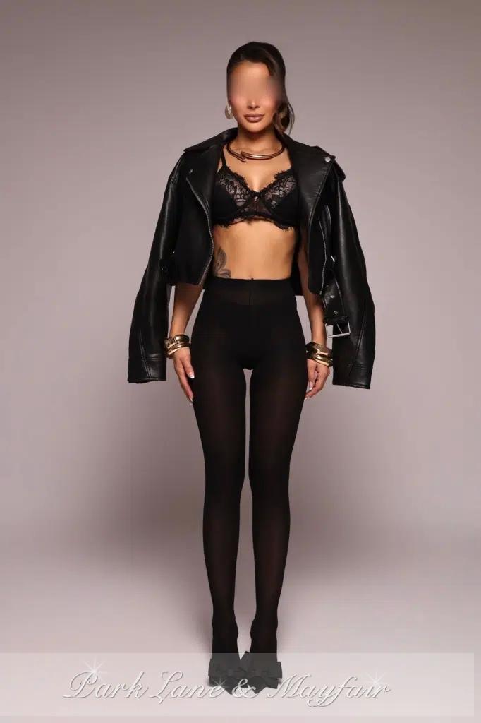 Dayana has a charming smile that beautifully enhances her natural features.