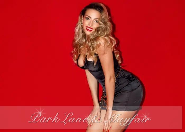 Francesca truly shines with her enchanting pose and sparkling eyes that draw you in.