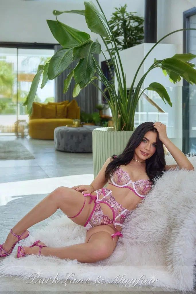 Frankie shows a natural combination of sensuality and elegance in her captivating pose.
