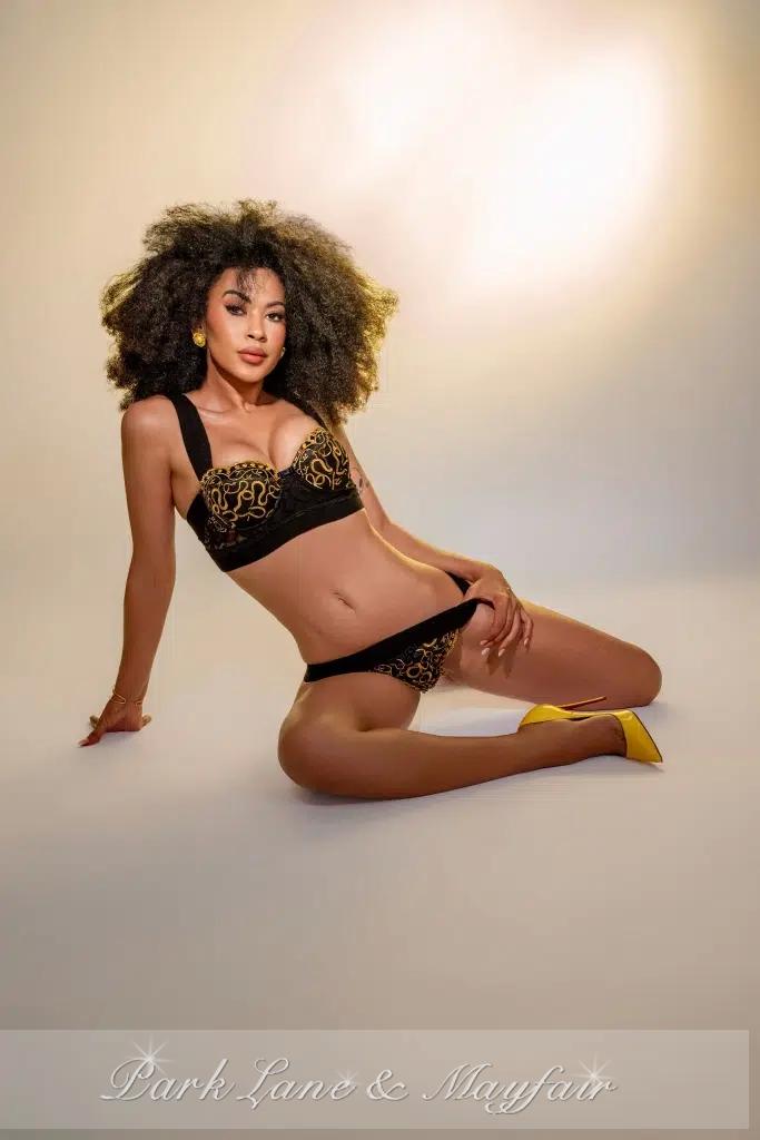 Jade shows a natural combination of sensuality and elegance in her captivating pose.