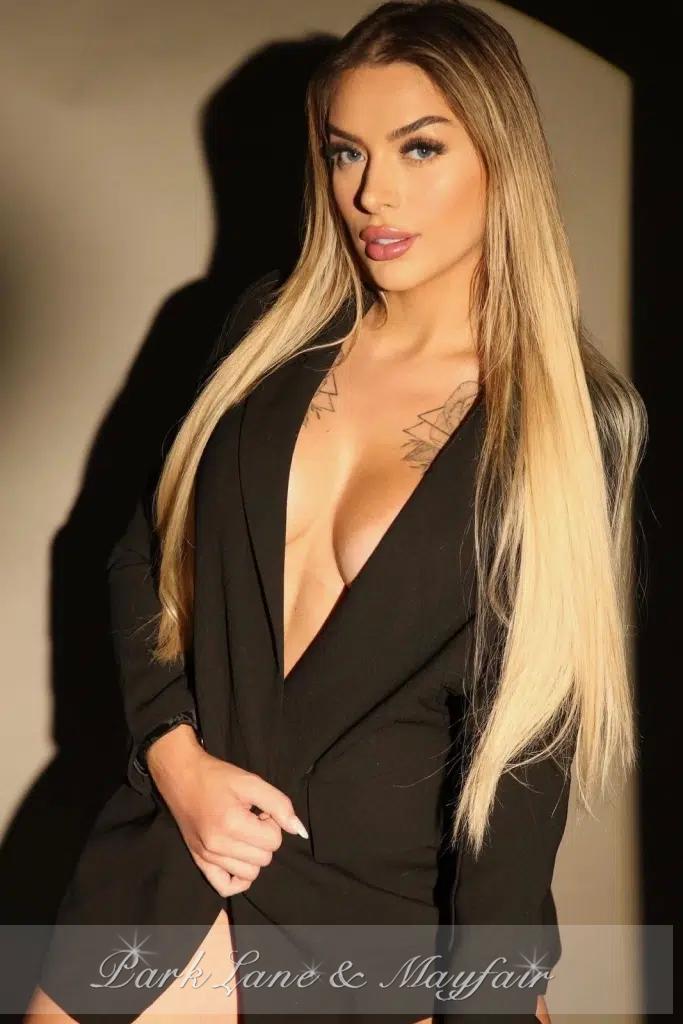 Jennifer has a charming smile that beautifully enhances her natural features.