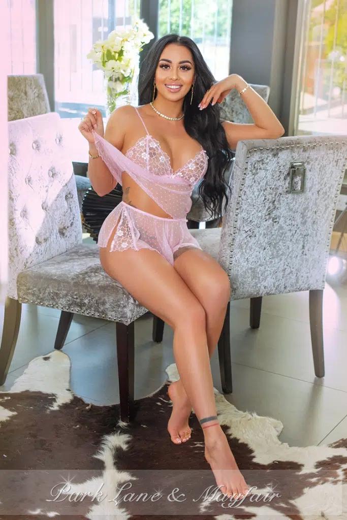 Larissa exudes a warm sophistication and engaging charm that naturally draws people in.
