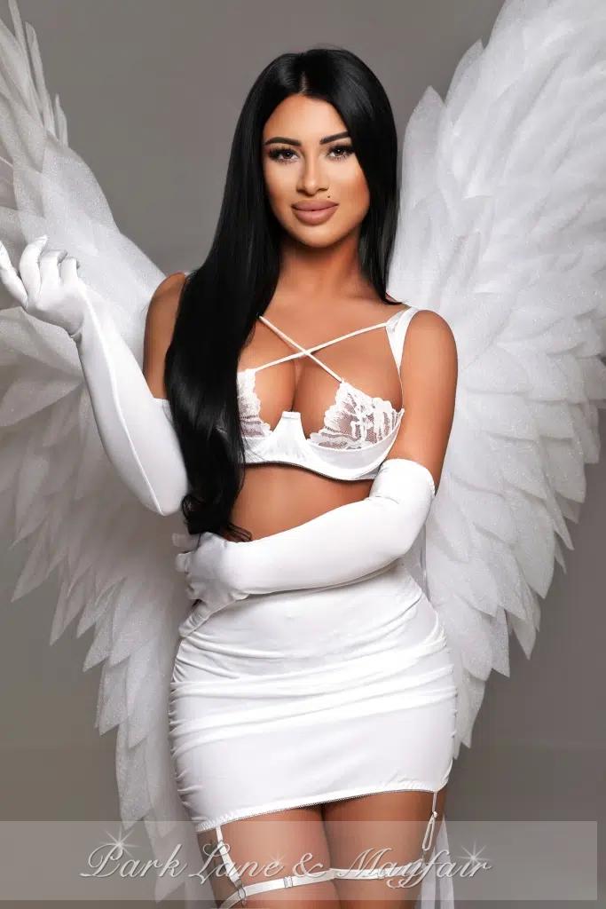 A captivating escort radiating grace in her stunning gallery images.