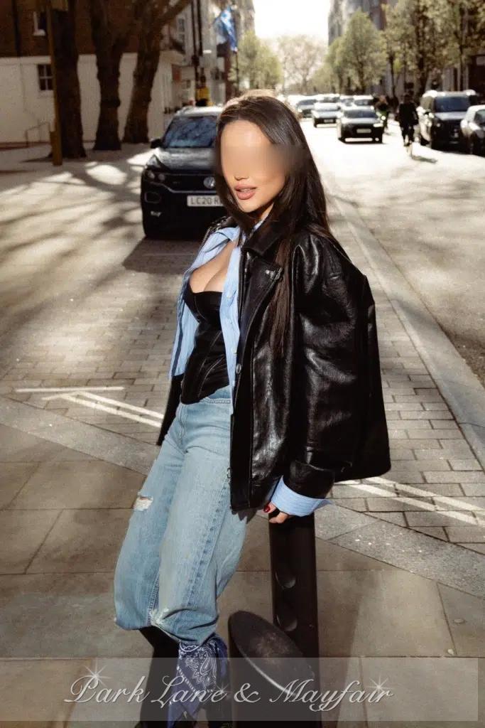 Noelle exudes a natural harmony of sensuality and grace in her striking pose.