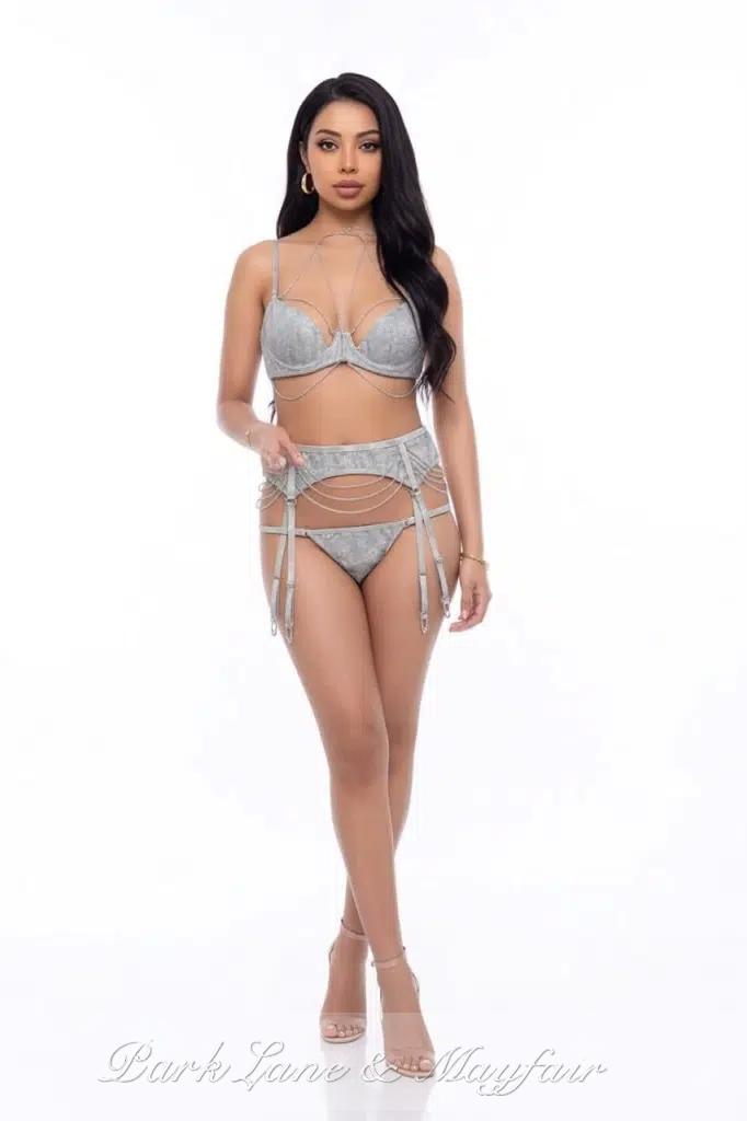 Priti displays a natural blend of sensuality and grace in her captivating pose.