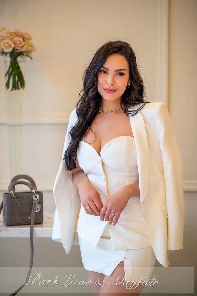 Rebecca effortlessly embodies a captivating blend of sensuality and elegance in her stunning pose.