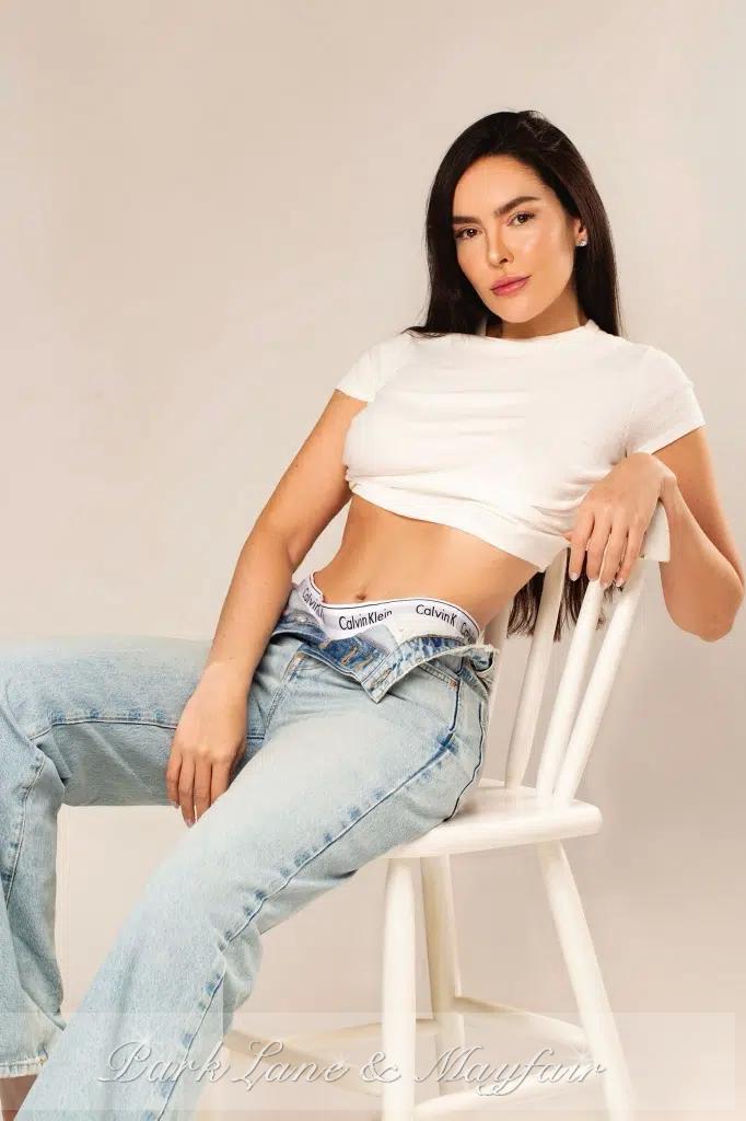 Rebecca truly shines with her enchanting pose and sparkling eyes that draw you in.
