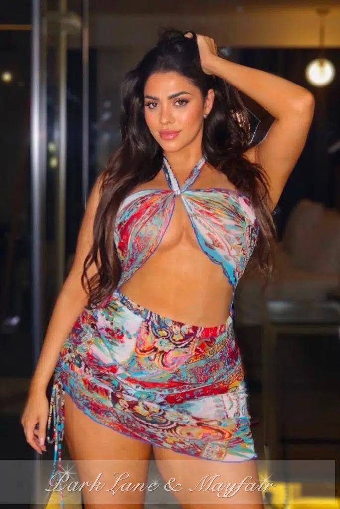 Roberta, a talented companion, proudly showcases her stunning, graceful curves.