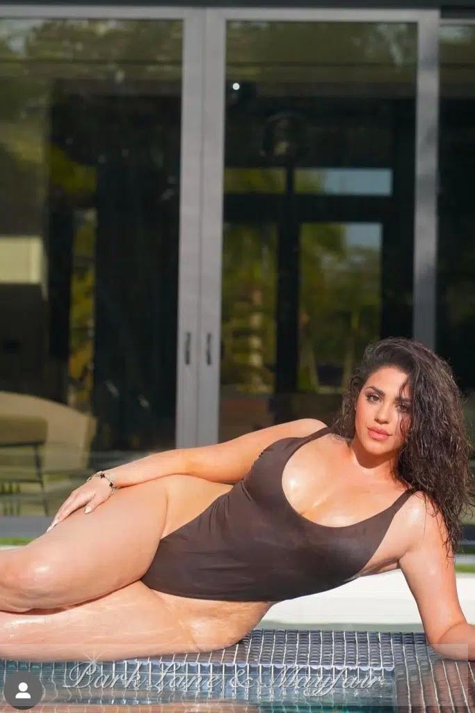 Roberta has a charming smile that beautifully enhances her natural features.