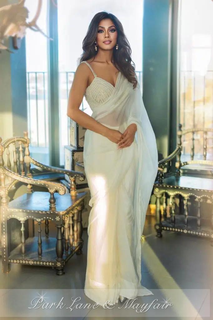 Sabrina captivates with her charming pose and radiant eyes that invite you closer.