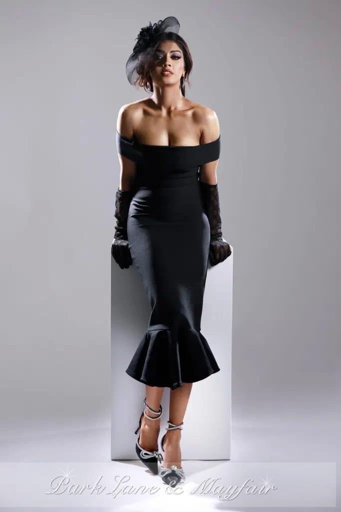 Sabrina naturally radiates a beautiful blend of sensuality and grace in her striking pose.