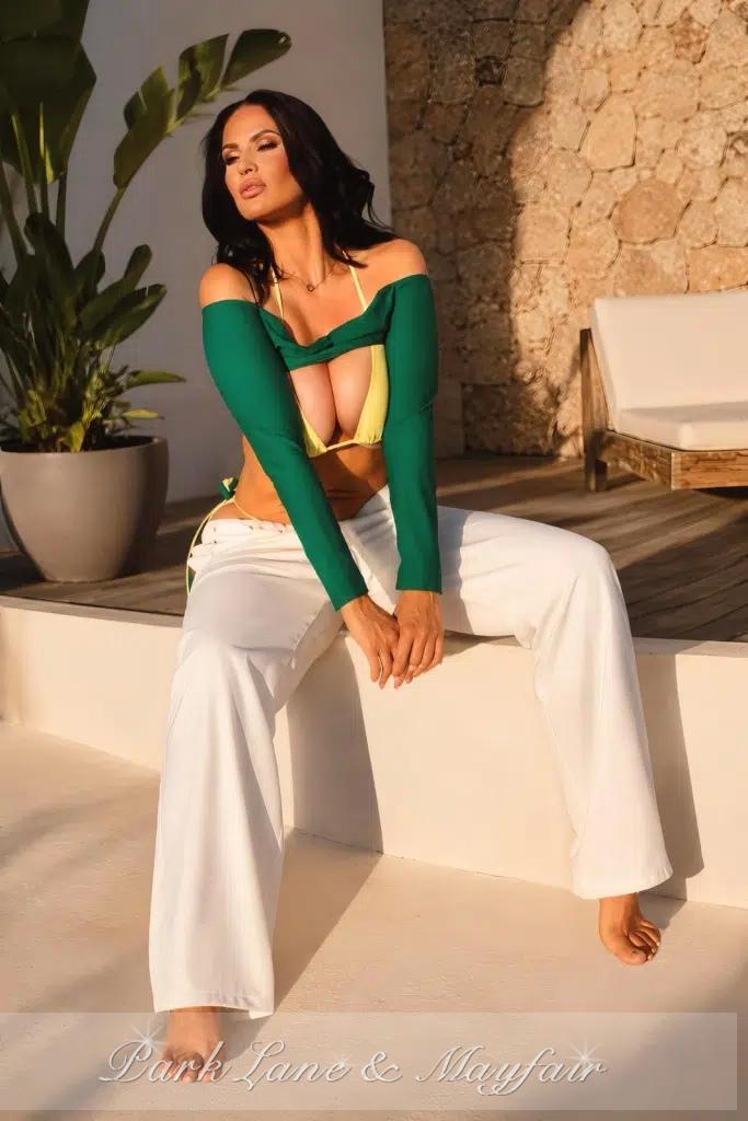 Saskia exudes a warm sophistication and engaging charm that naturally draws people in.